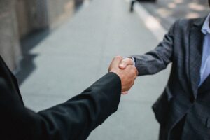 Two people shaking hands.